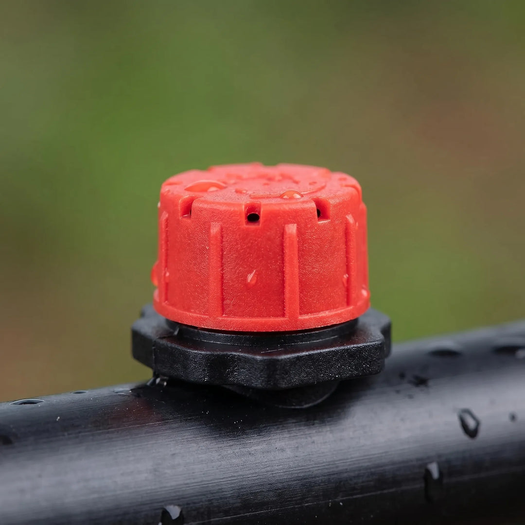 Set of adjustable drippers designed for a garden microdrip irrigation system, ensuring optimal plant watering.