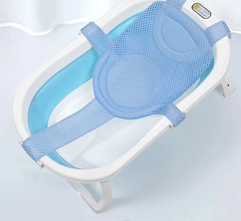 Adjustable baby bath support for newborns, designed for safety, comfort, and quick drying.