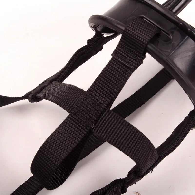 Adjustable silicone dog muzzle for small to large breeds, ensuring pet safety & comfort during walks.
