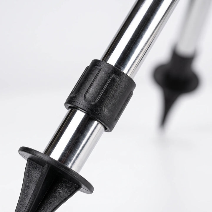 Outdoor adjustable lawn sprinkler with stable tripod base for easy garden irrigation and comprehensive watering system.