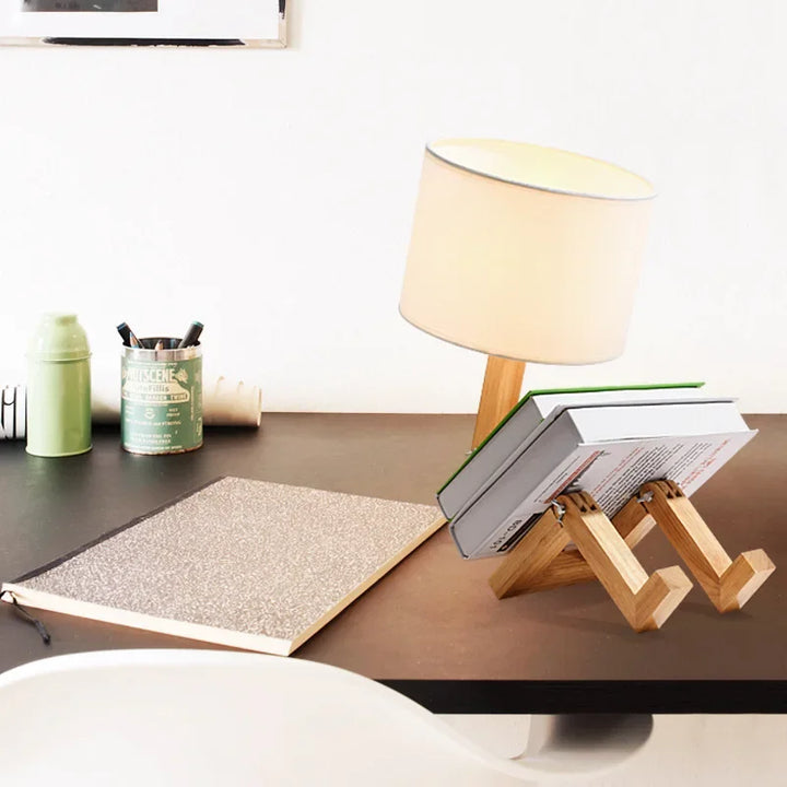 Stylish wooden robot lamp for tables, offering adjustable light and convenient storage.