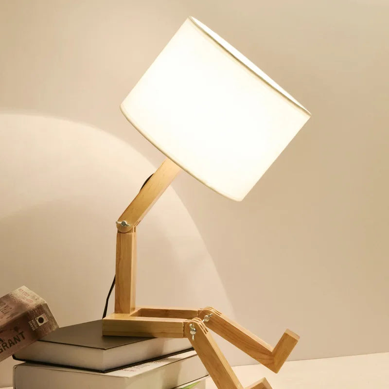 Ergonomic adjustable wooden desk lamp, a robot design with a built-in storage shelf.