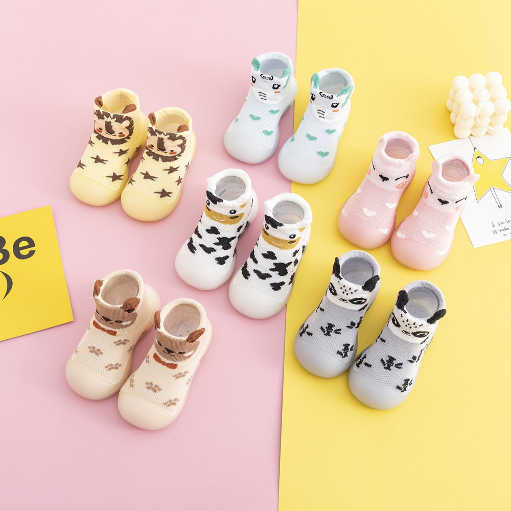Adorable animal knit anti-slip walker shoes for baby's first steps.