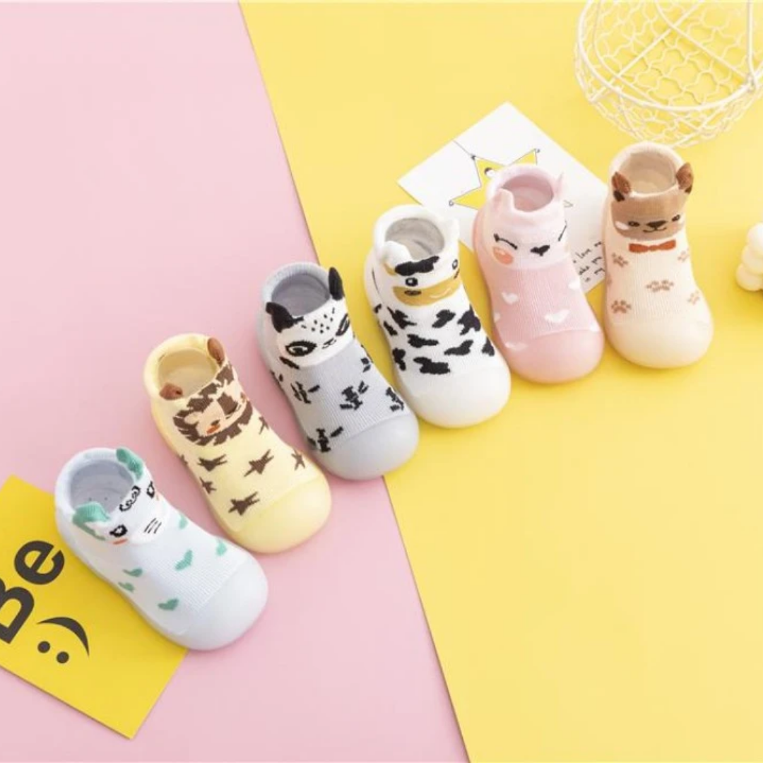 Soft sole baby walker shoes with cute animal design, perfect for infants.