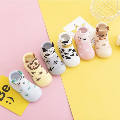 Soft sole baby walker shoes with cute animal design, perfect for infants.