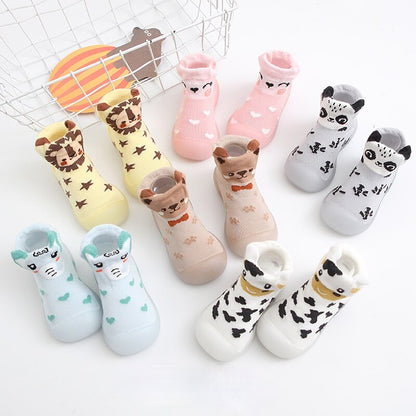 Cozy knit anti-slip baby booties, ideal for new walkers.