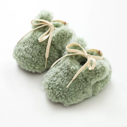 Cozy baby footwear: non-slip infant booties in a charming animal design, a great baby gift.