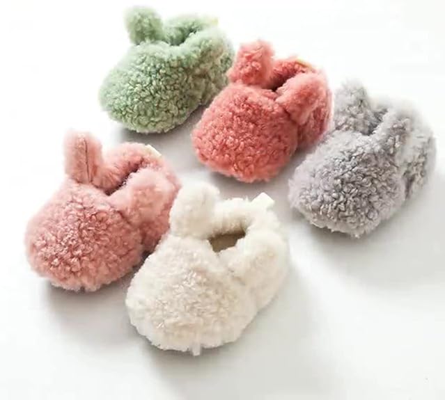 Warm baby animal non-slip booties, plush and perfect as a thoughtful infant gift.