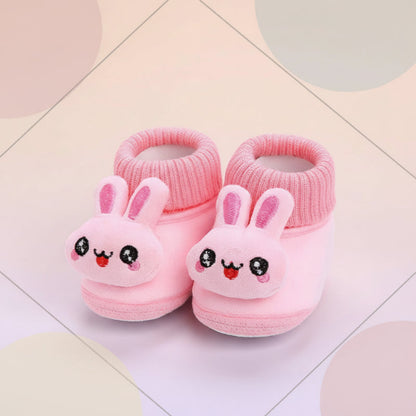 Unisex soft sole animal baby winter slippers, non-slip for growing little ones.