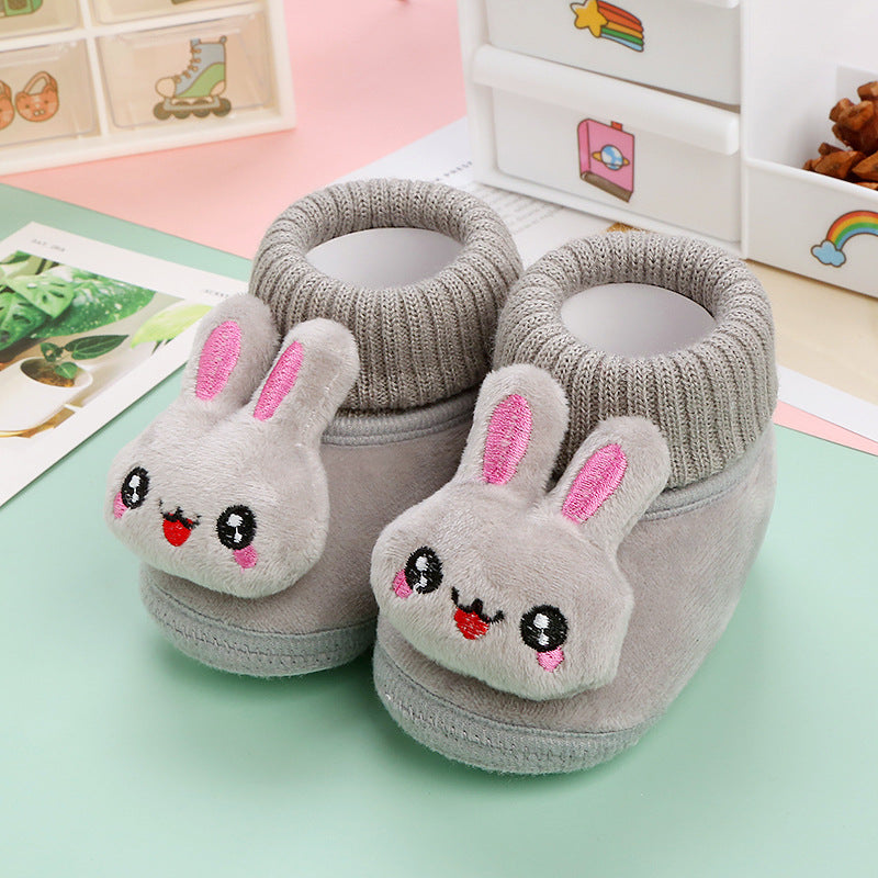 Infant non-slip animal winter shoes, ensuring warmth and stability for baby's initial steps.
