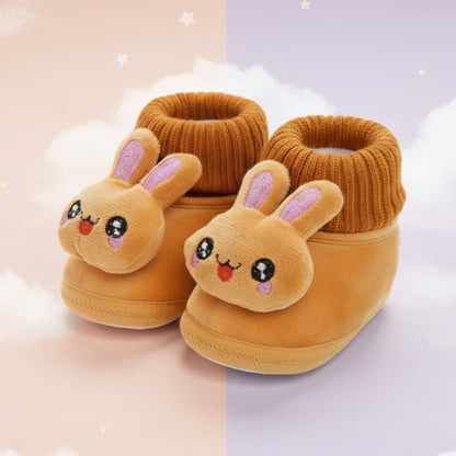 Warm plush animal baby slippers with non-slip soles, ideal for home and first steps.