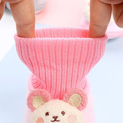 Cozy baby winter slippers with an animal design and non-slip grip for new walkers.