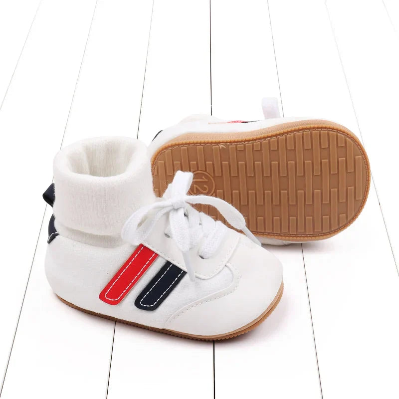 Comfortable baby anti-slip soft sole shoes, stylish infant footwear for autumn and daily wear.
