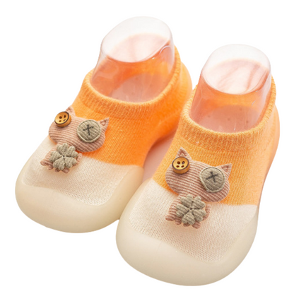Cute cat design baby walker shoes, anti-slip soft sole for infants, perfect and comfortable for young toddlers.