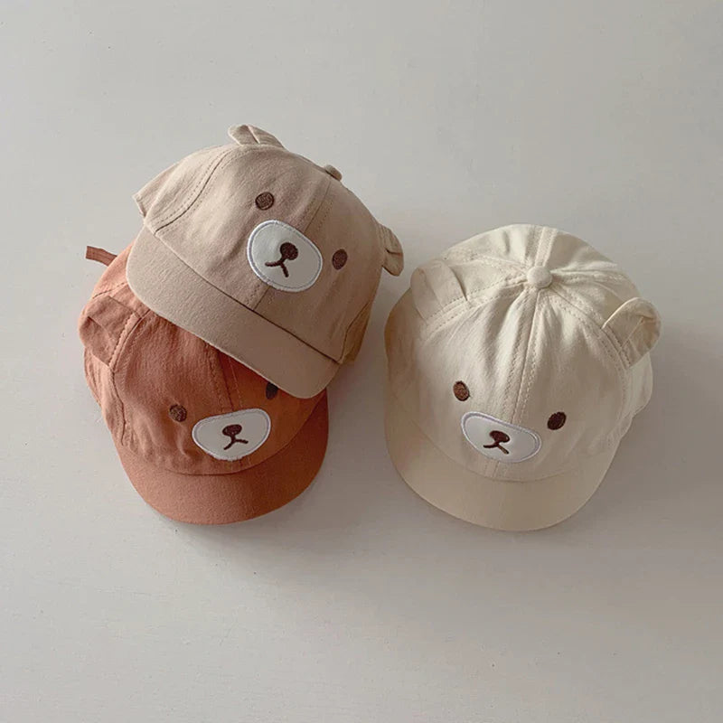 Cute toddler baseball cap featuring bear ears, perfect for sun protection and baby fashion.