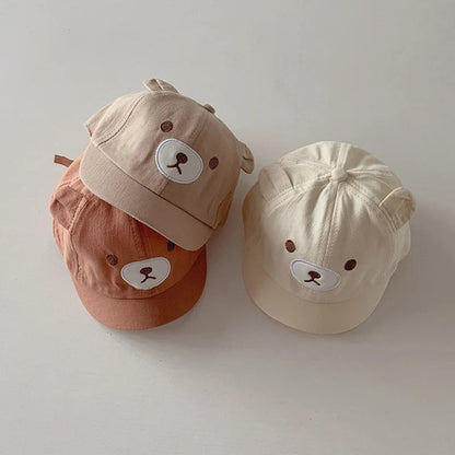Cute toddler baseball cap featuring bear ears, perfect for sun protection and baby fashion.