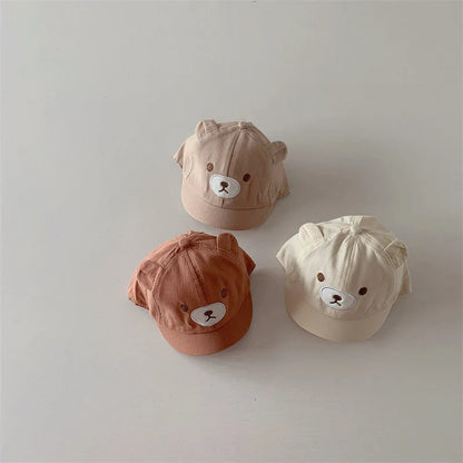 Infant headwear: adjustable cotton blend baseball cap with charming bear ears, ideal for outdoor baby gear.