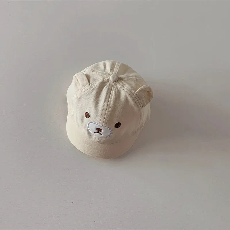 Front view of a baby bear ears baseball cap, emphasizing its adorable design and adjustable fit.
