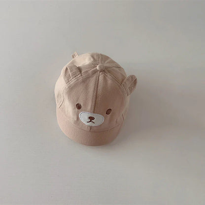 Toddler fashion accessory: adjustable baseball cap with bear ears, perfect for sunny days.