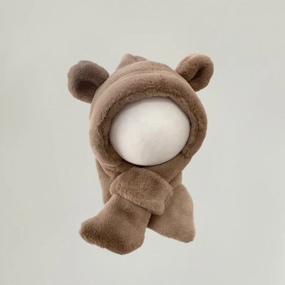 Cozy toddler bear hat with attached scarf, perfect for cold weather, unisex baby gear.