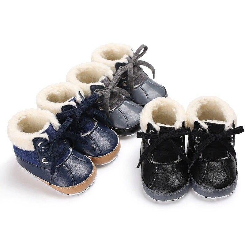 Close-up of fluffy baby winter shoes, cozy soft sole for pre-walkers, unisex design