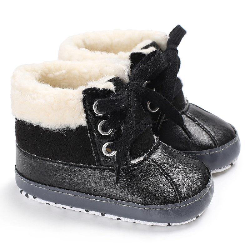 Pair of baby winter shoes, soft sole for comfort, hairy finish, ideal for cold weather
