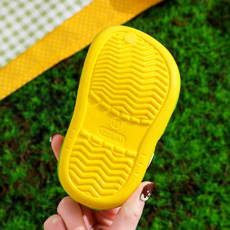 Baby cartoon anti-slip comfort slippers with animal design, providing toddler foot protection