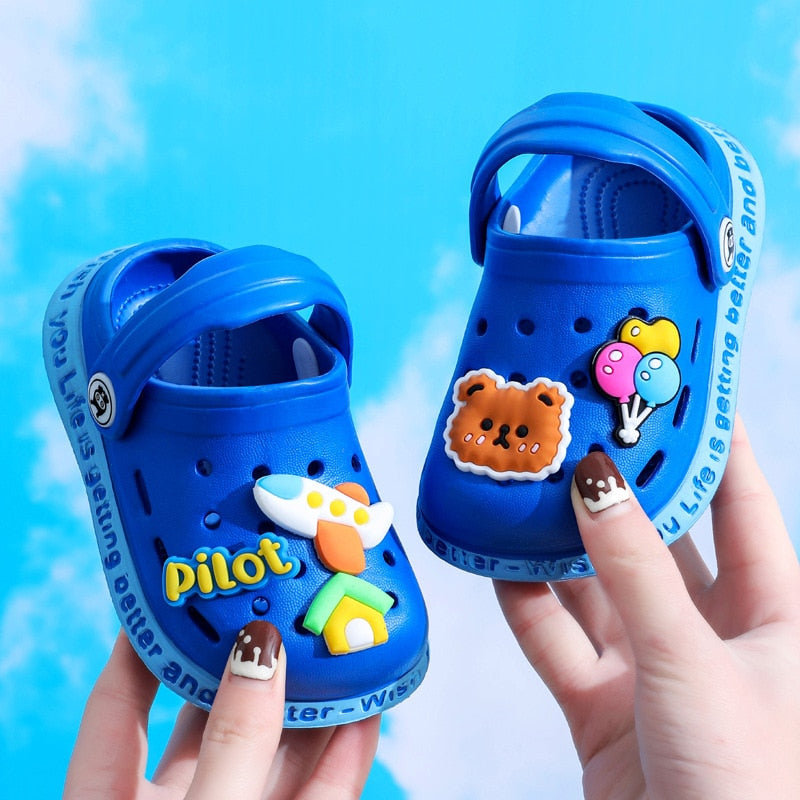 Close-up of a baby cartoon anti-slip slipper, showing soft sole and vibrant design