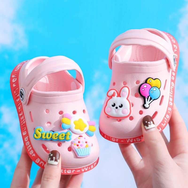 Top-down view of anti-slip baby cartoon slippers, highlighting fun design and secure fit