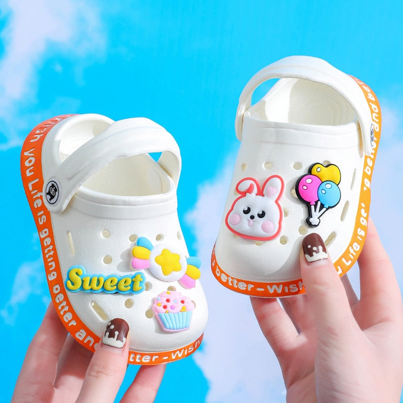 Pair of cheerful cartoon anti-slip comfort slippers, essential toddler footwear for home