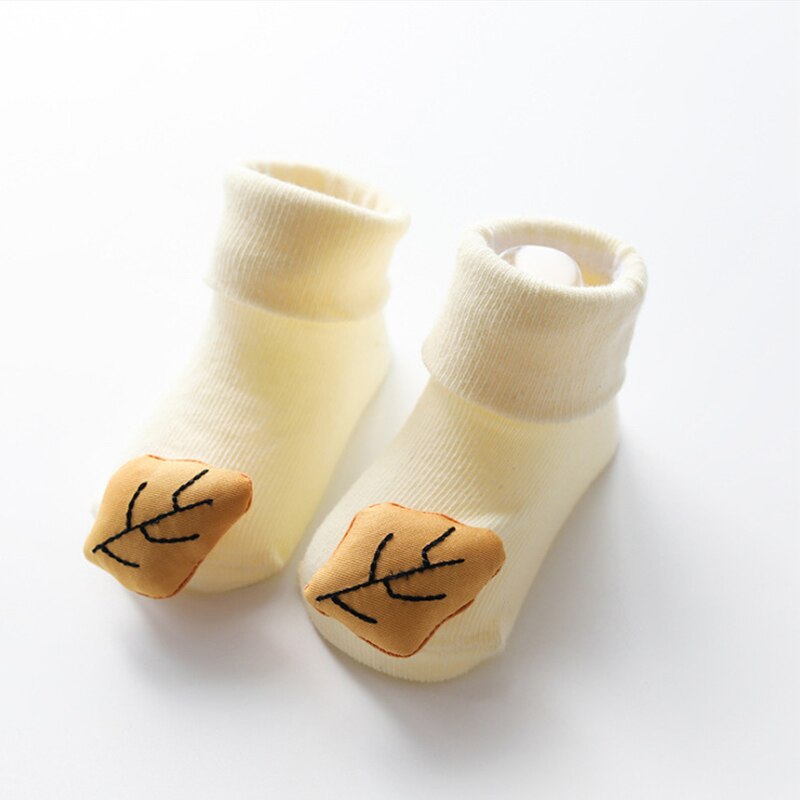 Unisex baby cartoon doll non-slip cotton socks, ideal for active toddlers learning to walk