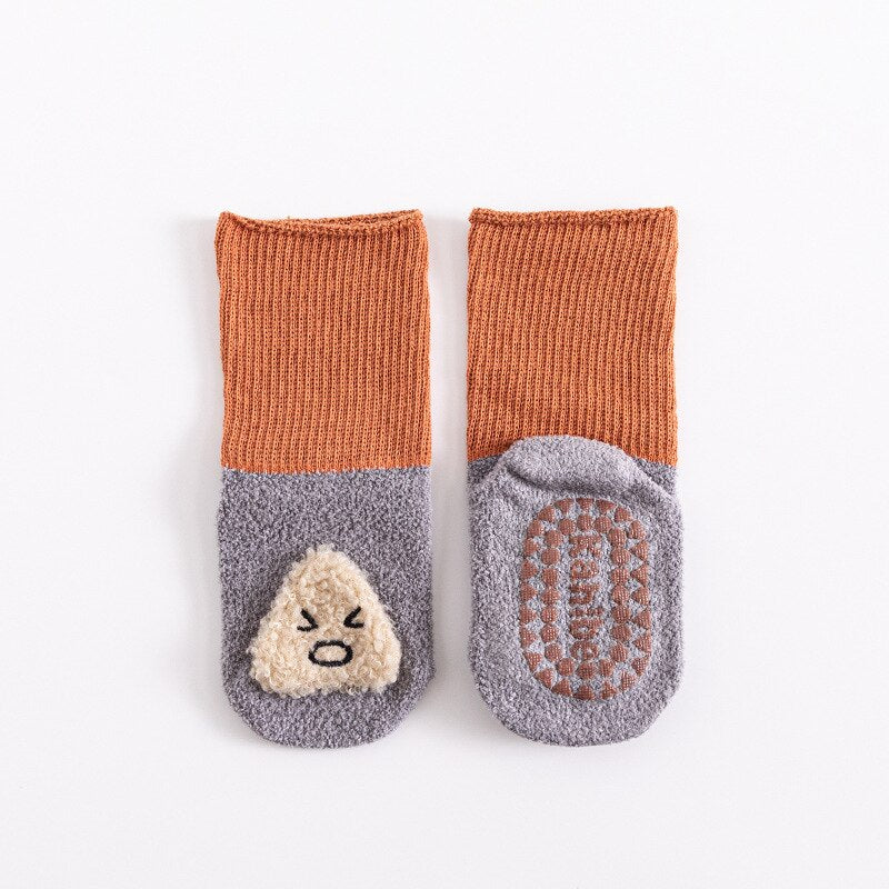 Soft baby elephant cartoon non-slip terry socks, ideal infant clothing for safe play at home.