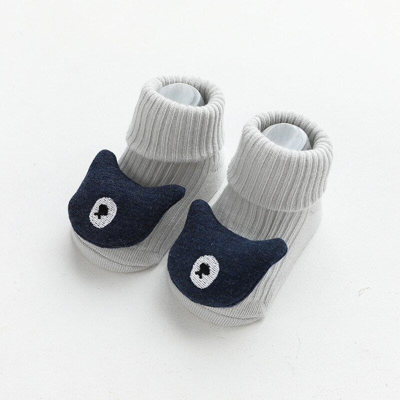Cotton baby non-slip socks featuring playful cartoon animals for active toddlers