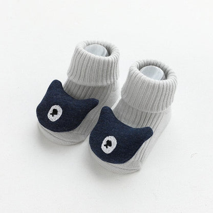 Cotton baby non-slip socks featuring playful cartoon animals for active toddlers