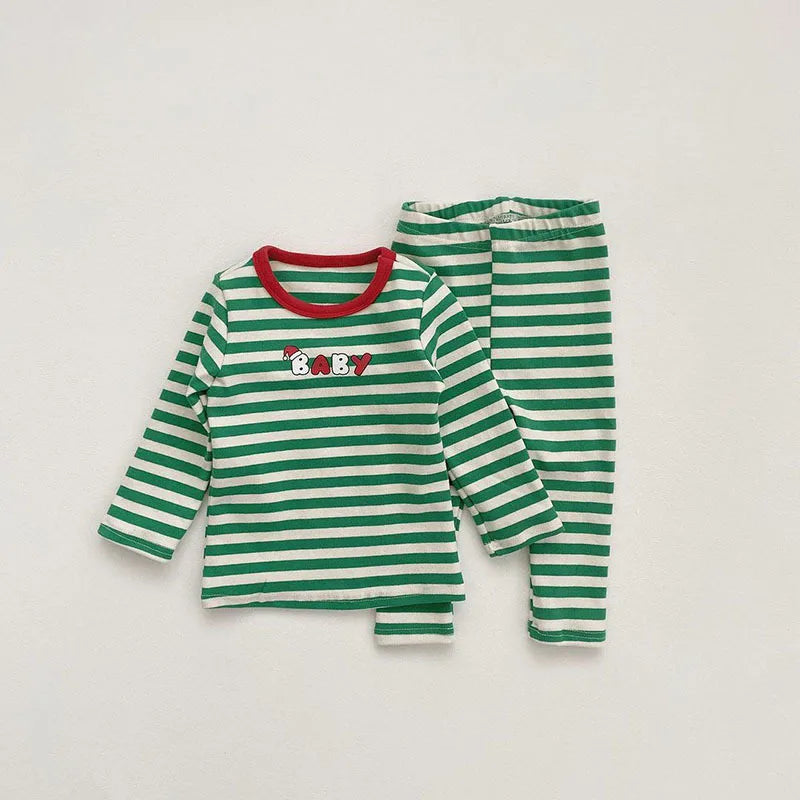 Cozy baby and toddler Christmas outfit: striped pajama set crafted from cotton blend with a cute removable hat.