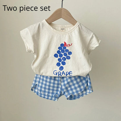 Vibrant orange baby sleeveless cotton pajamas with a whimsical cartoon design for warm nights