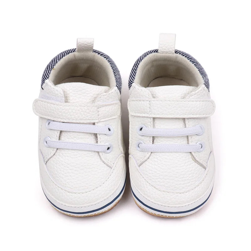 Close-up of a soft sole baby shoe, showcasing its flexible design and non-slip bottom.