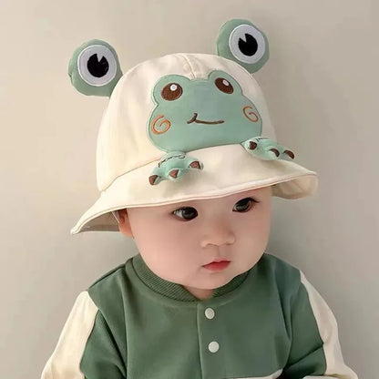 Adorable baby frog bucket hat in green, perfect for infant sun protection. Cute children's summer accessory.