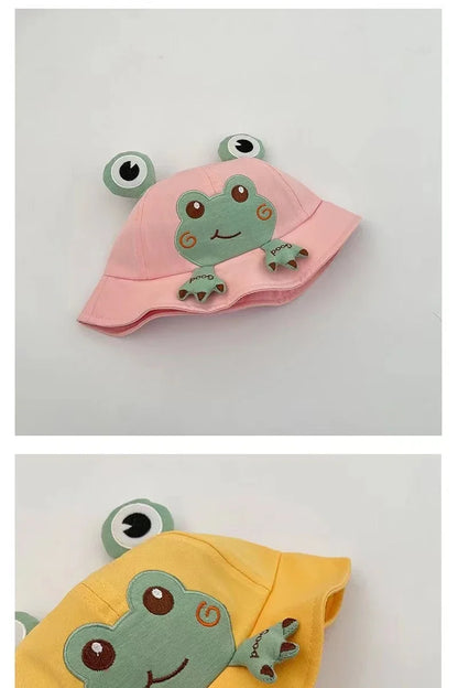 Patterned baby frog bucket hat with subtle frog details, stylish sun protection for children.