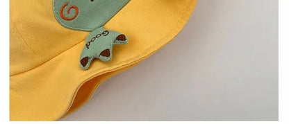 Baby frog bucket hat in a vibrant green color, designed for maximum sun protection and cuteness.