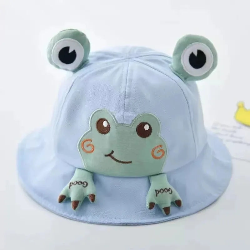 Foldable baby frog bucket hat, lightweight and perfect for travel sun protection. Infant summer accessory.