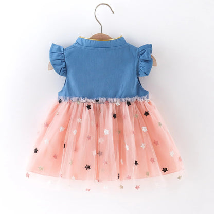 Back view of a girls' denim dress featuring cute flying sleeves and a comfortable fit.