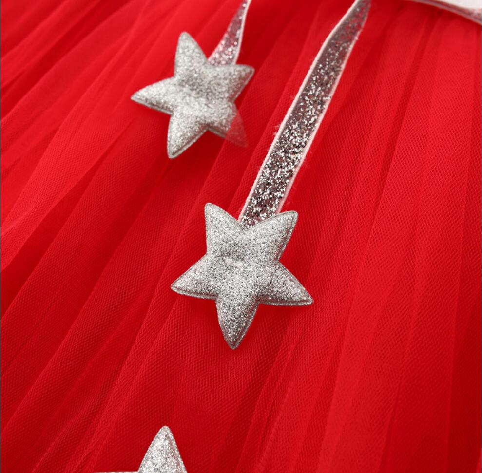 Full-length view of a charming long sleeve mesh star party dress for girls, suitable for any celebration.