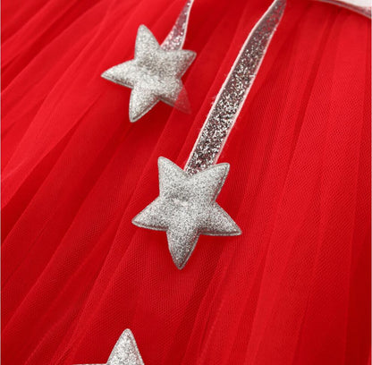 Full-length view of a charming long sleeve mesh star party dress for girls, suitable for any celebration.