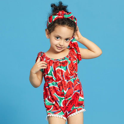 Adorable baby girl in a watermelon print swimsuit with a matching headband, perfect for summer beach wear