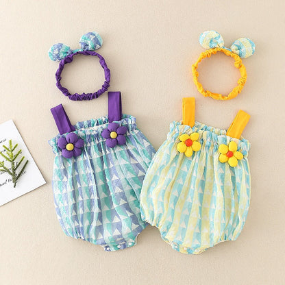 Toddler girl in a soft cotton summer romper, perfect for warm weather playtime