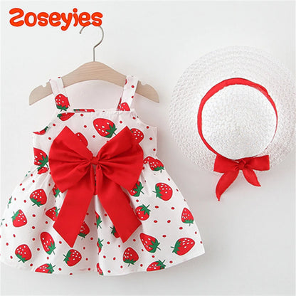 Cute infant girl's strawberry pattern dress with ruffled sleeves and coordinating sun hat set.