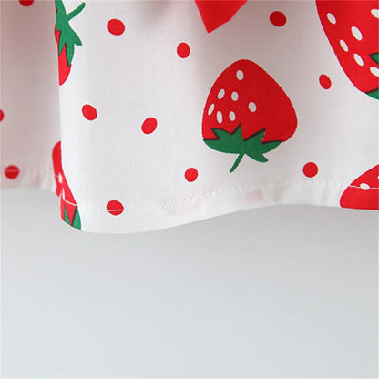 Back view of a baby girl's strawberry print dress featuring a comfortable, breathable design.