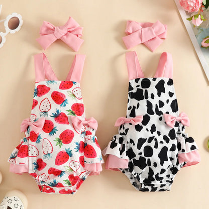 Adorable baby girl romper with vibrant strawberry print and matching headband, perfect for summer.