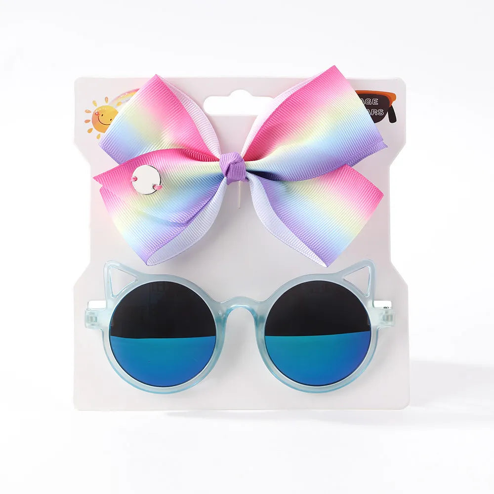 Sun protection for baby girls: adorable cartoon sunglasses with a matching hair bow set.